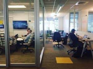 Office workers coworking at NGIN Workplace